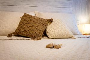 Cama ou camas em um quarto em Pousada Hospedaria215
