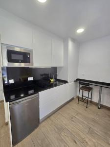 Kuchyňa alebo kuchynka v ubytovaní SM Apartments