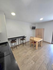 Televízia a/alebo spoločenská miestnosť v ubytovaní SM Apartments