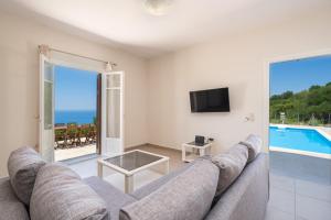 A television and/or entertainment centre at The Sunset Villa Kefalonia