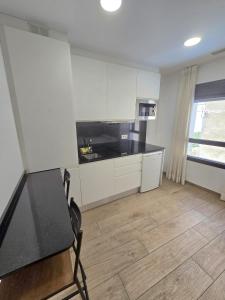 Kuchyňa alebo kuchynka v ubytovaní SM Apartments