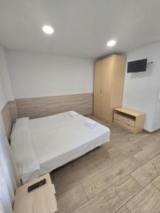 Posteľ alebo postele v izbe v ubytovaní SM Apartments