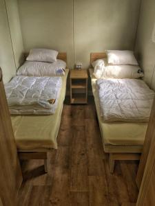 A bed or beds in a room at Badacsony Camping
