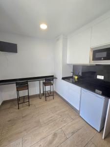 Kuchyňa alebo kuchynka v ubytovaní SM Apartments