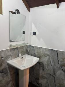 Baðherbergi á Manju Homestay