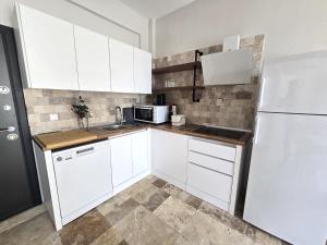 Η κουζίνα ή μικρή κουζίνα στο Vacation at walking distance to the sea