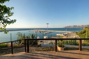 a view of a marina with boats in the water at Baia Marina Suite with private jacuzzi in Balestrate