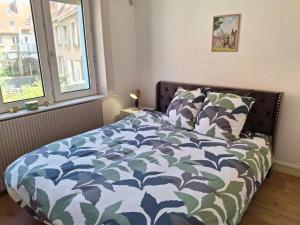 Postel nebo postele na pokoji v ubytování Cosy 50 M2 avec parking privé et vue mer LE PORTEL