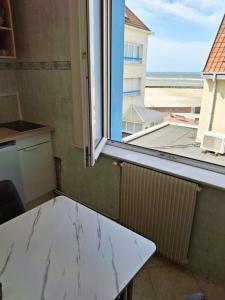 Postel nebo postele na pokoji v ubytování Cosy 50 M2 avec parking privé et vue mer LE PORTEL