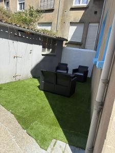Zahrada ubytování Cosy 50 M2 avec parking privé et vue mer LE PORTEL
