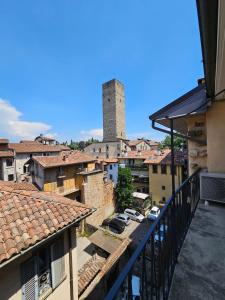 a view of a city from a balcony at Piazza Vecchia Boutique Apartment in Bergamo