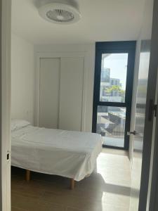 Katil atau katil-katil dalam bilik di Habitación con piscina comunitaria +8 gambar