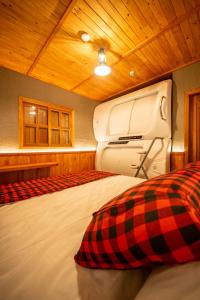 Katil atau katil-katil dalam bilik di The Lodge Iguassu +18 gambar