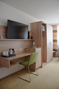 TV a/nebo společenská místnost v ubytování Hotel Cristal