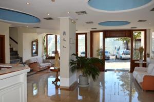 a living room with a couch and a table at Art Pythia Boutique in Delphi