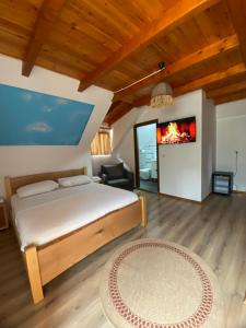 Tempat tidur dalam kamar di Gegest Hotel