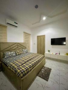 Ένα ή περισσότερα κρεβάτια σε δωμάτιο στο Kobby Apartments