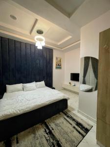 Ένα ή περισσότερα κρεβάτια σε δωμάτιο στο Kobby Apartments