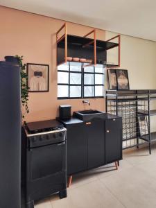 Kuchyň nebo kuchyňský kout v ubytování Mini House 01