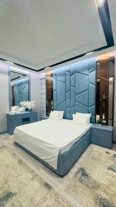 Ένα ή περισσότερα κρεβάτια σε δωμάτιο στο Gardens resident +63 φωτογραφίες