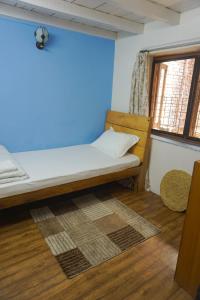 Letto o letti in una camera di Jhigu Homestay Patan