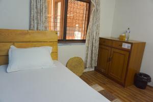 Letto o letti in una camera di Jhigu Homestay Patan