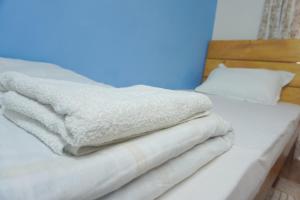 Letto o letti in una camera di Jhigu Homestay Patan