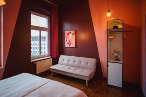 Cama ou camas em um quarto em The Circus Hostel