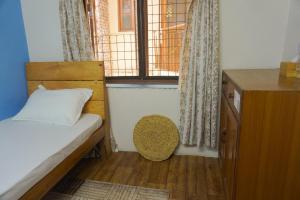 Letto o letti in una camera di Jhigu Homestay Patan