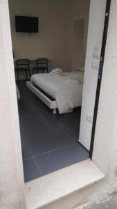 Letto o letti in una camera di PM 5 Via Salita di Castelvecchio