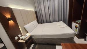 Postel nebo postele na pokoji v ubytování Melody Queen Hotel by AURA