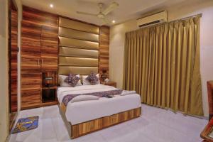 Postel nebo postele na pokoji v ubytování Meriton Buisness Hotel Mumbai International airport T-2