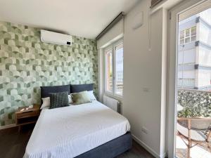 Ένα ή περισσότερα κρεβάτια σε δωμάτιο στο Suardi Residence 1 +13 φωτογραφίες