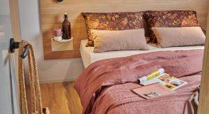 Postel nebo postele na pokoji v ubytování Camping Les Palmiers