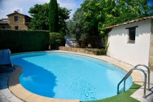 Bazén v ubytování Le Mas Des Aigras - Hôtel & Restaurant de Charme en Provence nebo v jeho okolí