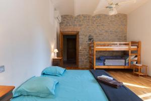Postel nebo postele na pokoji v ubytování Maison De Vacances Sud Ardèche