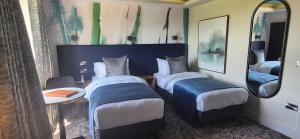 Postel nebo postele na pokoji v ubytování Hotel67