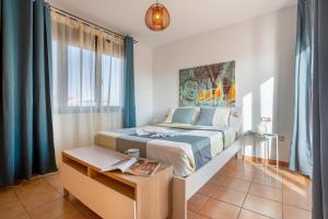 Ένα ή περισσότερα κρεβάτια σε δωμάτιο στο Vanilla Ocean Chalet +24 φωτογραφίες