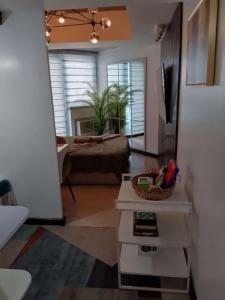 TV a/nebo společenská místnost v ubytování Bali in Azure North with PS4 Staycation + 29 fotografií