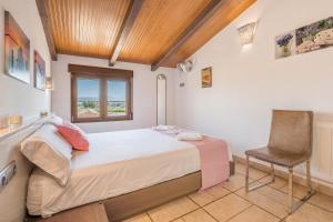 Postel nebo postele na pokoji v ubytování Apartamentos la Vega de Granada + 98 fotografií