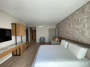 Postel nebo postele na pokoji v ubytování Residence Saranda International