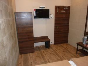 TV a/nebo společenská místnost v ubytování Hotel Regal Palace