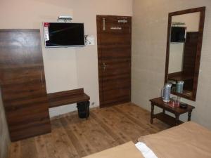 TV a/nebo společenská místnost v ubytování Hotel Regal Palace