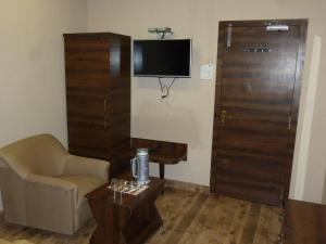 TV a/nebo společenská místnost v ubytování Hotel Regal Palace