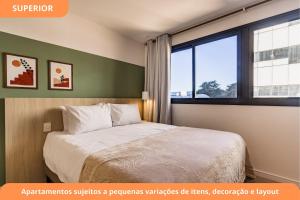 Letto o letti in una camera di GO Carlos Gomes by My Way
