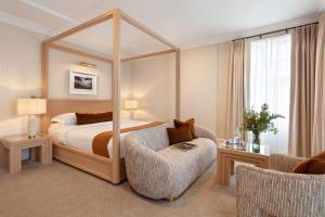 Voodi või voodid majutusasutuse Killarney Royal Townhouse toas