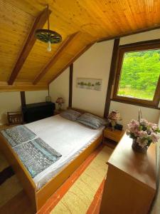 Postel nebo postele na pokoji v ubytování UNA Dream