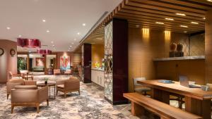 a lobby of a hotel with a desk and chairs at Crowne Plaza Florya Istanbul by IHG in Istanbul