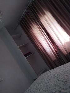 Ένα ή περισσότερα κρεβάτια σε δωμάτιο στο Appartement num3 Carthage byrsa