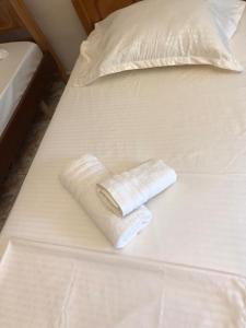 Una cama o camas en una habitación de Guesthouse